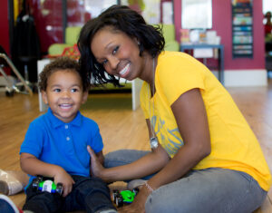 Smiling mom with her little boy - Pigtails & Crewcuts Buckhead