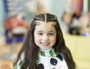Smiling girl with crown braids - Pigtails & Crewcuts Smyrna