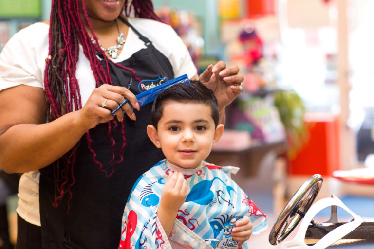Little boy getting his hair styled - Pigtails & Crewcuts Smyrna