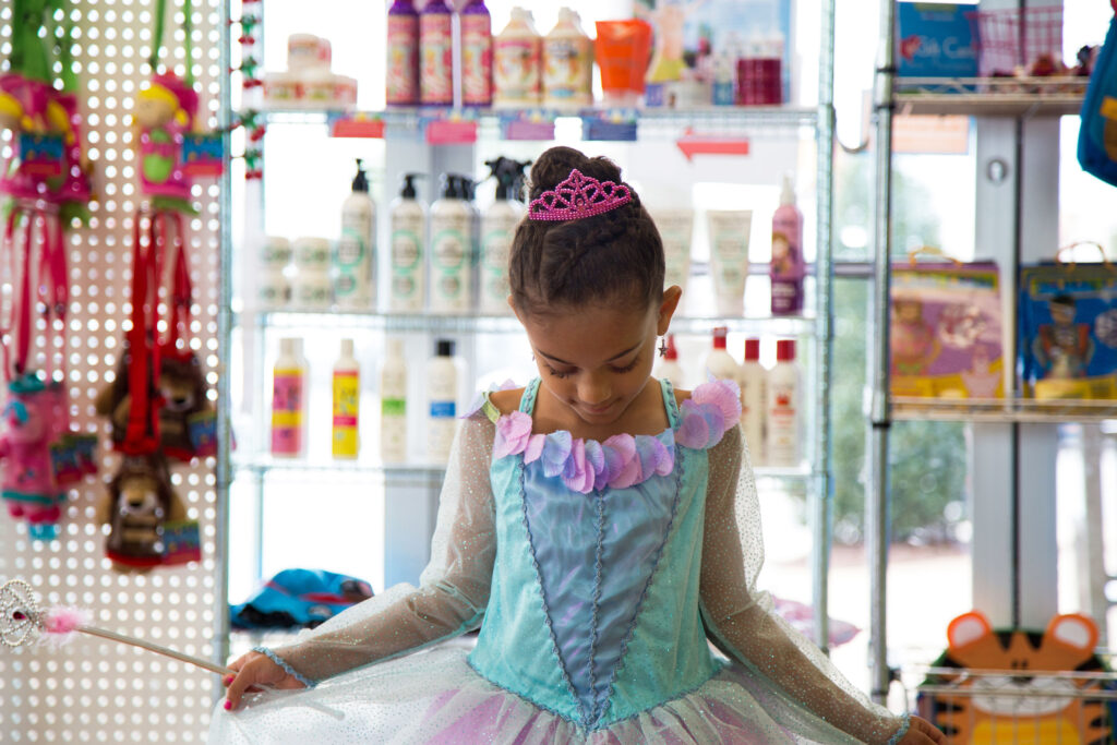 Girl dressed as a princess with a tiara and wand - Pigtails & Crewcuts Smyrna