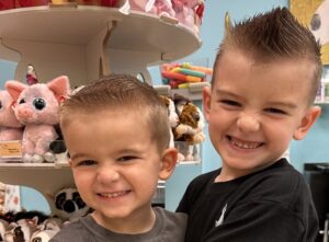 Two siblings just got haircuts at Pigtails & Crewcuts - Happy Valley