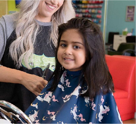 Girl getting her Back 2 School haircut at Pigtails & Crewcuts Jacksonville