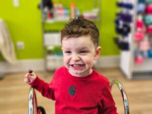 Smiling toddler boy - Pigtails & Crewcuts Jacksonville