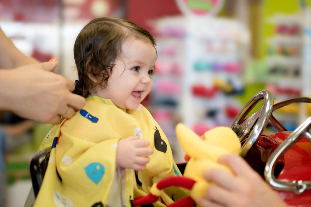 Baby's First Haircut - Happy Little Girl Toy Duck