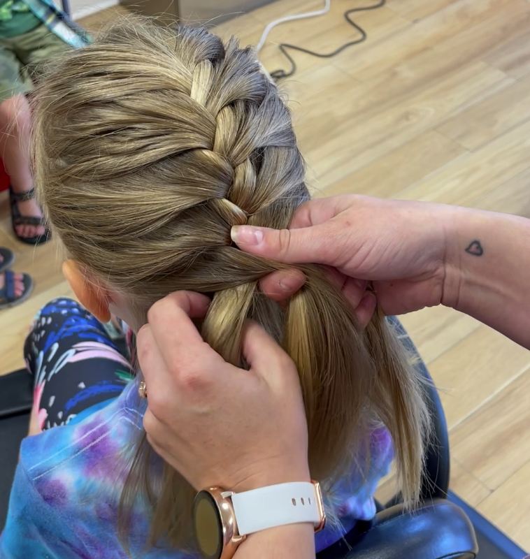 The easy way to French plait your child's hair before they go back